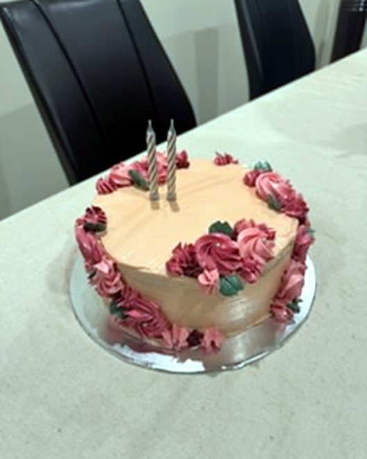 Pink rosette birthday cake