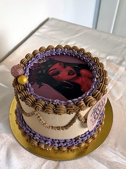 Custom edible-image cake with gold trim