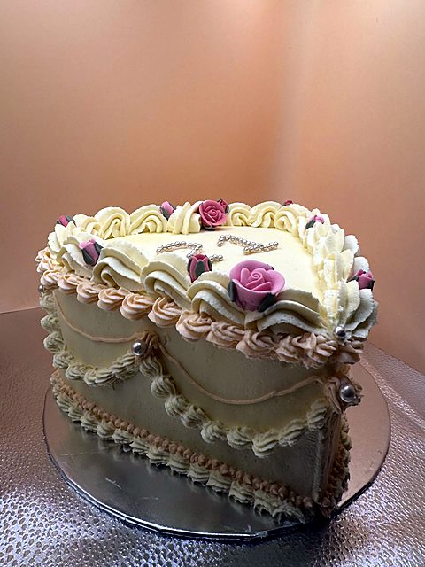 Vintage heart cake with piped roses