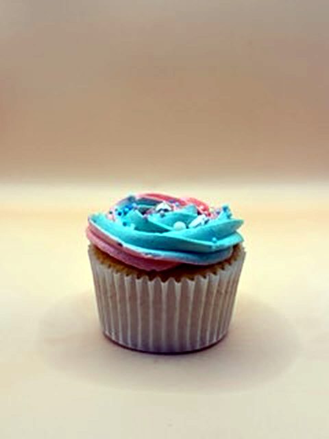 Pastel pink and blue swirl cupcake